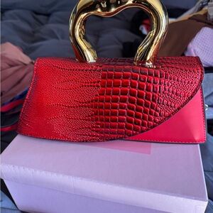 Red and Gold Crocodile-Embossed Clutch with Heart Handle